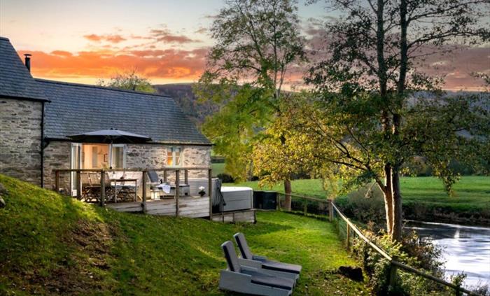 As the sun goes down the warmth of the log fire entices you into the cosy cottage